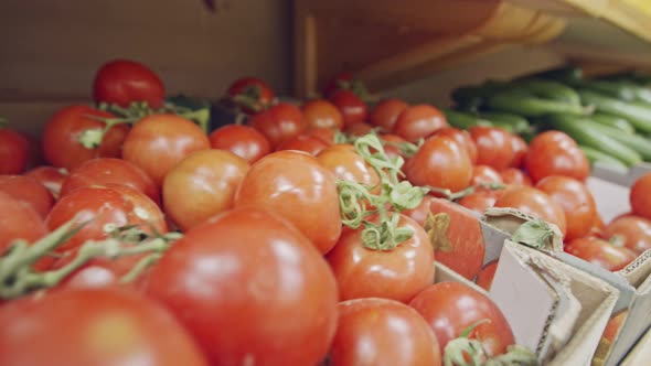 Large variety of vegetables and fruits on a supermarket shelves