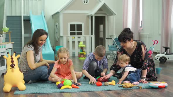 Teachers and Toddlers Playing at Kindergarten