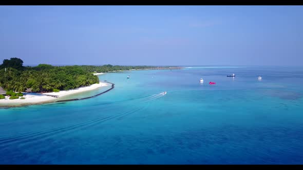 Aerial top down tourism of relaxing tourist beach journey by turquoise lagoon and white sand backgro