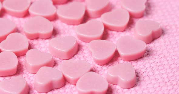 Pink chocolate on pink background