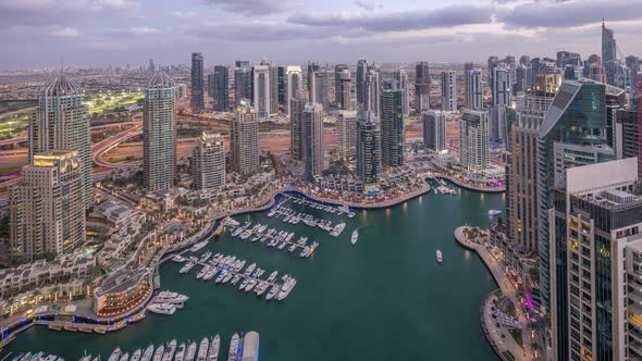 Dubai Marina Skyscrapers and Jumeirah Lake Towers View From the Top Aerial Day to Night Timelapse in