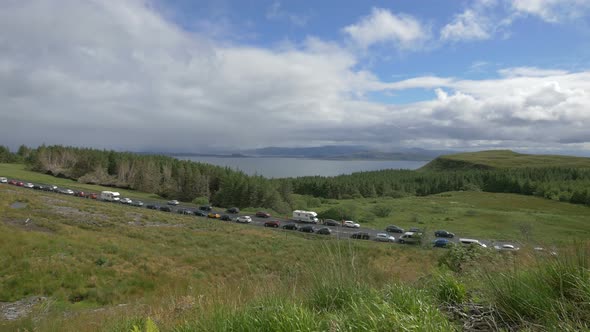 Parked cars seen from a hill