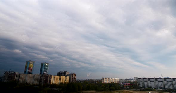 City Buildings Under Cloudy Sky