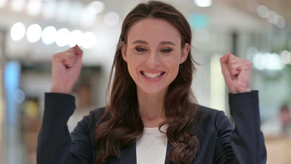Portrait of Excited Businesswoman Celebrating Success, Cheering