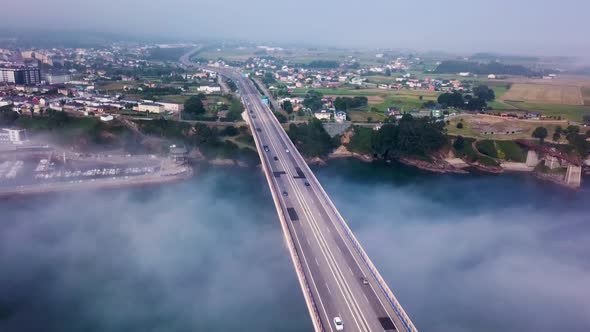 Aerial View on Dos Santos Bridge During Fog and Bay. Near Ribadeo in Northern Spain