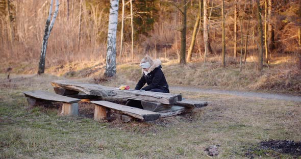 Female Tourist Taking Brake in Mountains and Use Digital Tablet