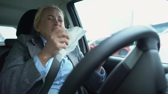 Ill Female in Suit Sneezing in Tissue on Drivers Seat, Suffering Grippe, Disease