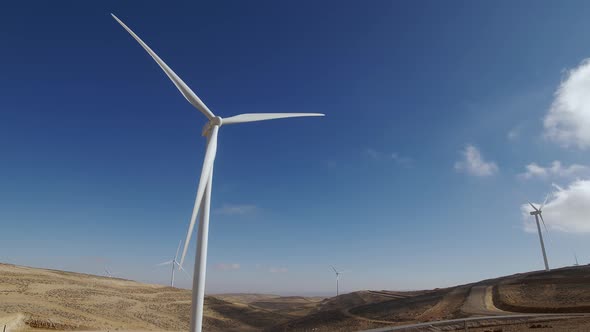 Modern Wind Turbines on Desert
