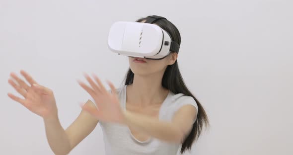 Woman play game with VR device