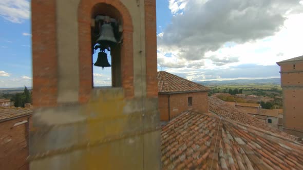 Church of San Cristoforo, Bettolle, Tuscany. Fpv drone view of the Italian village of Bettolle