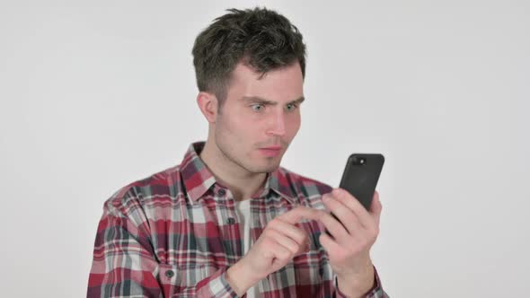 Portrait of Young Man Loss on Smartphone