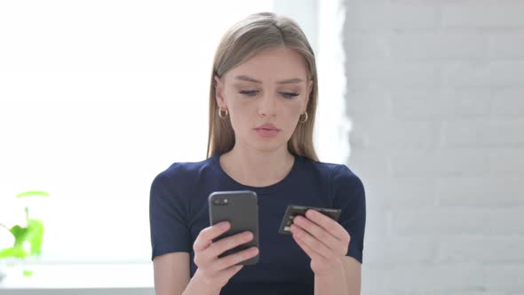 Portrait of Woman Unable to Make Online Payment on Smartphone