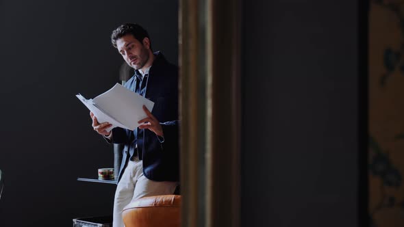 Businessman reading documents in the office