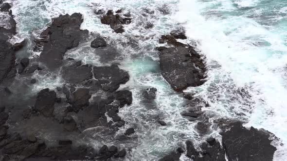 Footage of beautiful blue ocean waves crashing the rocky shore at Loch Ard Gorge 12 Apostles Coast a
