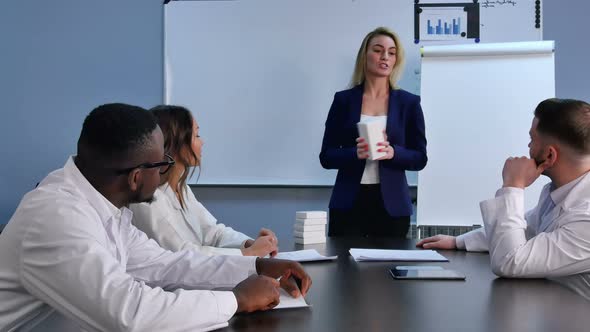 Young Businesswoman Presenting New Tablets or Pills To Doctors