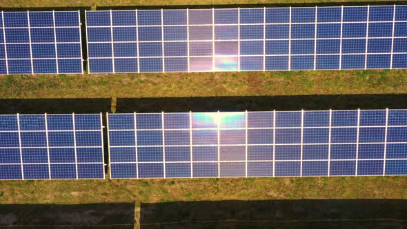 Top view of a new solar farm. Rows of modern photovoltaic solar panels. Renewable ecological source