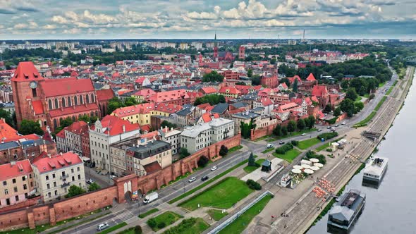 Summer view of Torun old town and Jozef Pilsudski bridge.