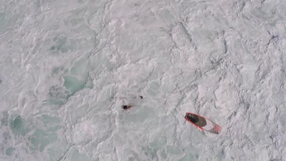 Aerial view of a wipeout sup stand-up paddleboard surfing in Hawaii