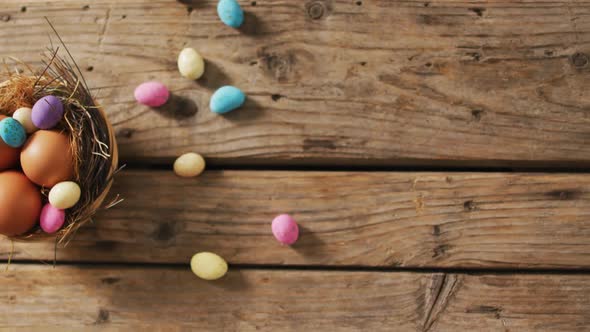 Video of decorated colorful easter eggs on a wooden surface