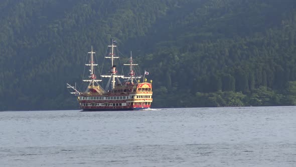 Close-up, The view of traditional japanese ship enters right to the picture in Ashi lake