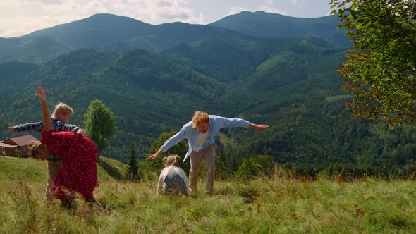 Parents Enjoy Funny Games with Children at Mountains Meadow