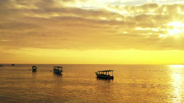 Silhouettes of Three Tourist Fishing Boats in the Arabian Sea, Indian Ocean, Goa, India