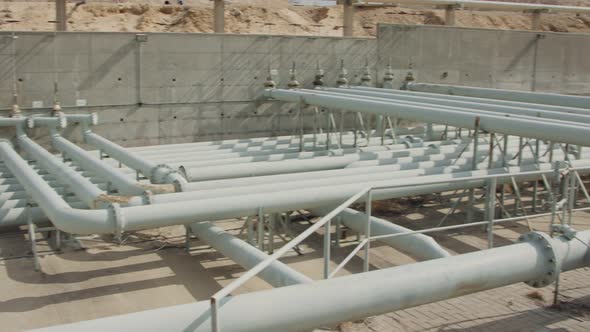 Oil and gas pipes and valves at a large oil refinery