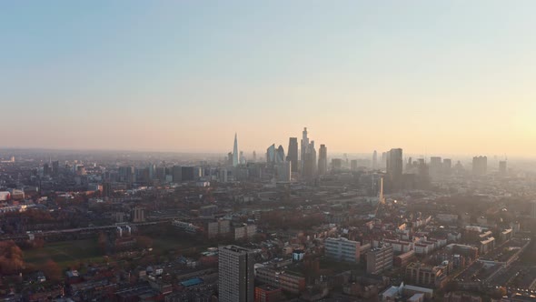 High rising drone shot of London beautiful clear sunset