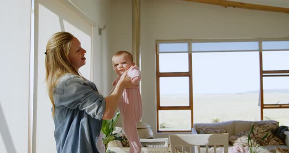 Mother playing with her baby boy 4k