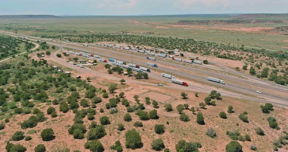 Panoramic Aerial Horizontal View of Rest Area Truck Stop on the Car Parking Endless Interstate