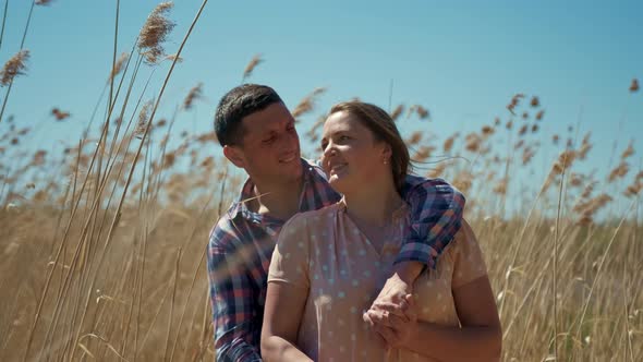 Family Couplein Standing in the Reeds