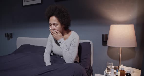 Black Female Coughing in Morning