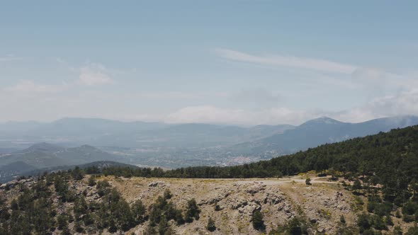 White clouds going down from mountains