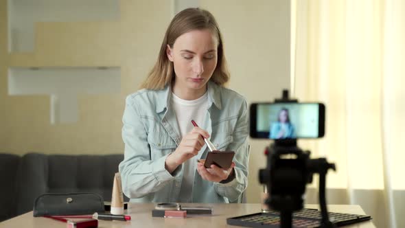 Female Blogger Making a Video for Her Beauty Blog on Cosmetics