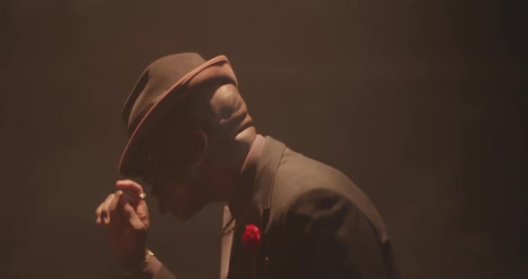 Cool Spinning Dancer On Stage In Suit And Hat