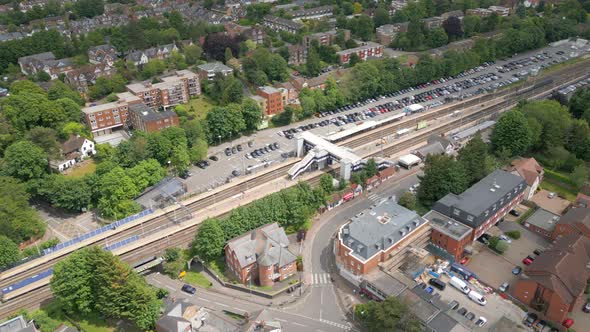 Commuter Trains at a Station in the UK Aerial Time Lapse