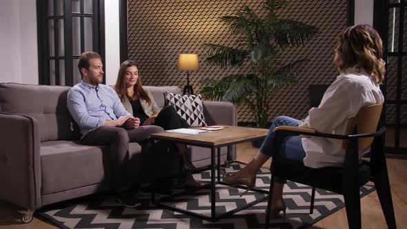 Happy Couple at Final Meeting with Psychologist