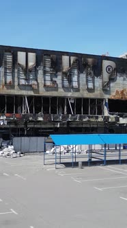 Vertical Video of a Destroyed Building of a Shopping Center in Bucha Ukraine