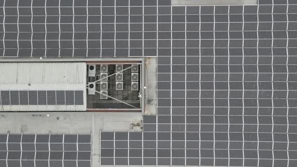 Solar Panels On Rooftop Of An Office Building In Park West Business Park, Dublin, Ireland. aerial to