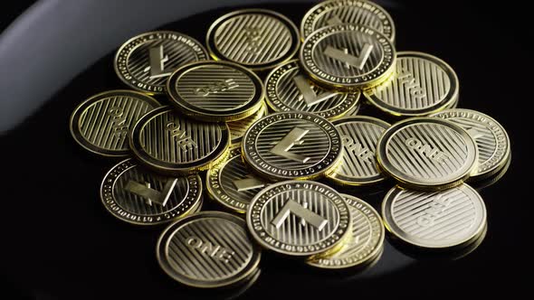 Rotating shot of Bitcoins (digital cryptocurrency) - BITCOIN LITECOIN 312