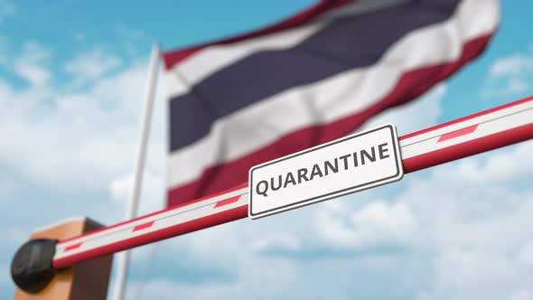 Opening Boom Barrier with QUARANTINE Sign at Flag of Thailand
