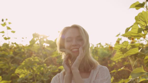 Romantic Girl In Sunflower Field