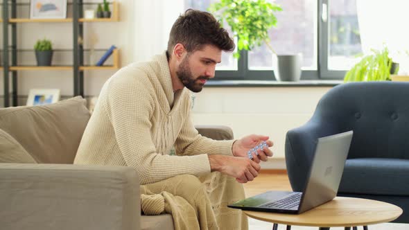 Sick Man with Medicine Having Video Call on Laptop