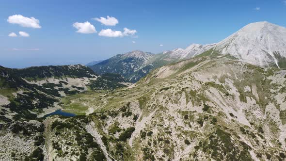 Aerial View of a Lake in the Pirin Mountains with Blue Clear Water