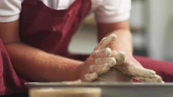 Man Ceramist Makes a Pitcher Out of Clay Closeup View Handicraft the Process of Creating Pottery