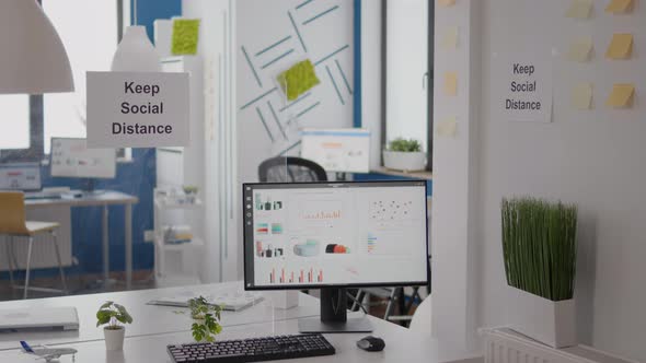 Keep Social Distance Signs and Posters in Empty Modern Business Office