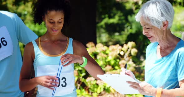 Athletes registering themselves for marathon 4k