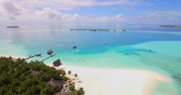 Aerial drone view of a scenic tropical island in the Maldives