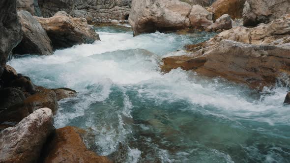 Rapid Flow of Water in a Mountain River with Rapids