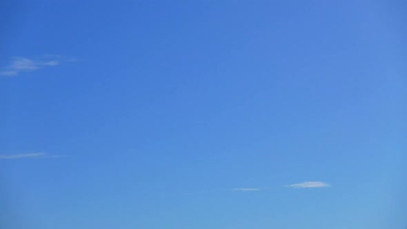 Time lapse of white cloud moving pass around sky background